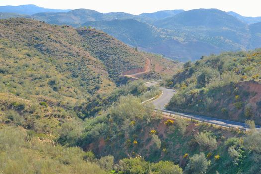 view from the mountain road leading over the city malaga