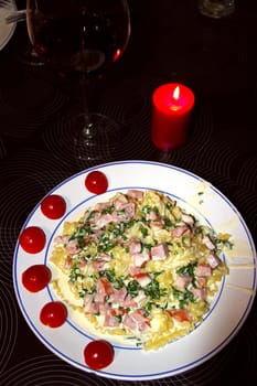 Spaghetti with cream sauce and ham. Italian Cuisine