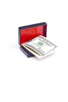 Dollars in the black box isolated on white