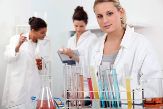 Three females in laboratory