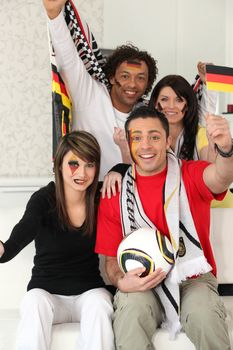 Two couples supporting German football