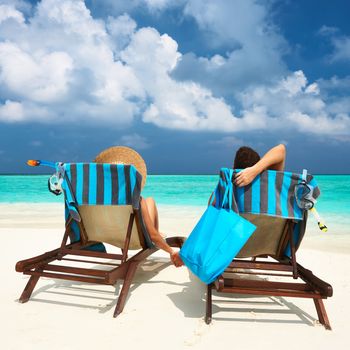 Couple on a tropical beach at Maldives