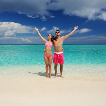 Couple on a tropical beach at Maldives