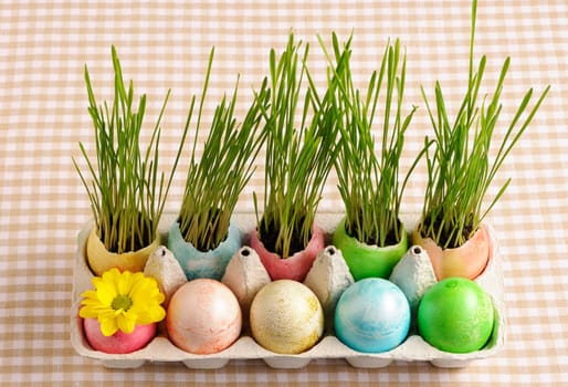 Colored easter eggs on table