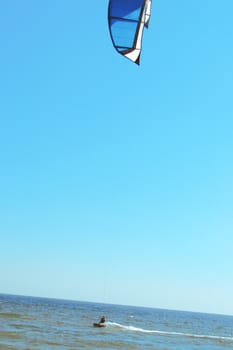 Kitesurfing . Kite Surfer in the waves 