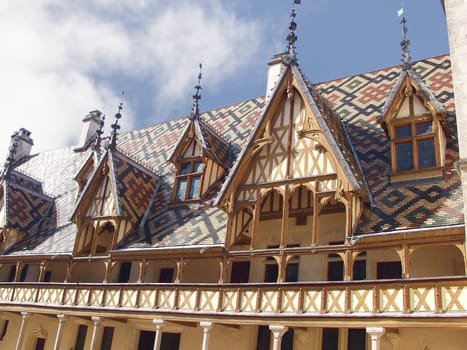 The mosaic roof Hospice in Bon (Hôtel-Dieu de Beaune). France