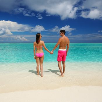 Couple on a tropical beach at Maldives