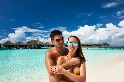 Couple on a tropical beach at Maldives