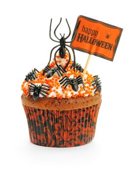 Halloween cupcake with decoration isolated on white