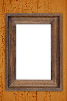 Vintage wooden frame on a wood made wall.