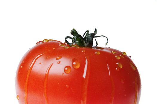 ripe tomato covered bright drops on a white background