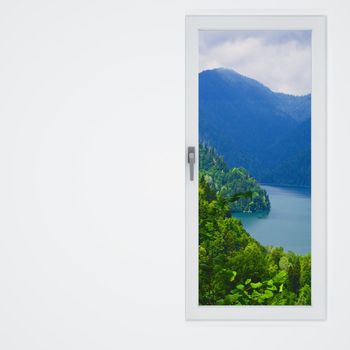 white wall and window with a beautiful view on mountains and lake