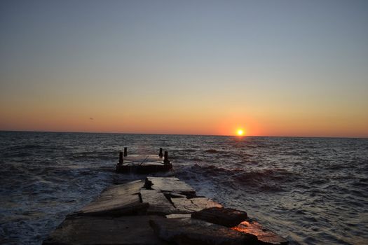 View of the dock over sunset