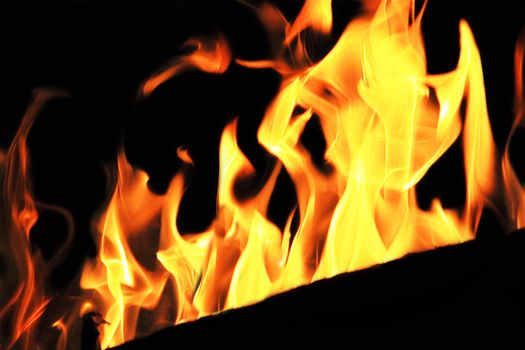 Image with red flame on the black background