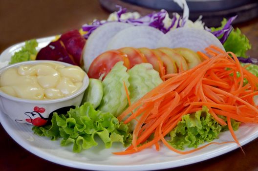 Fresh organic salad with cream sauce