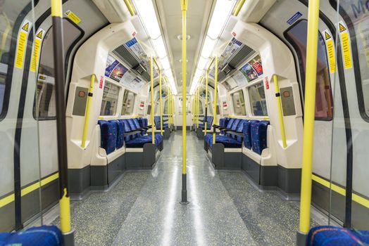LONDON, UK - APRIL 07: Interior of empty Northern line underground train showing access doors. April 07, 2013 in London.