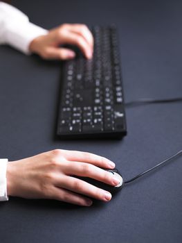 Business Secretary Typing on Computer Keyboard