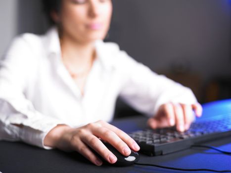 Business Secretary Typing on Computer Keyboard