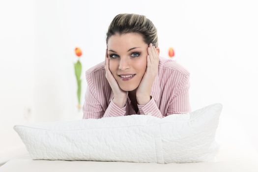 portrait of glamour woman alone on sofa