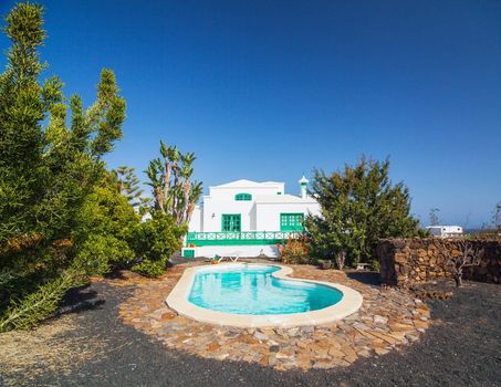 A typical summer villa with a swimming pool. Lanzarote, Canary Islands, Spain