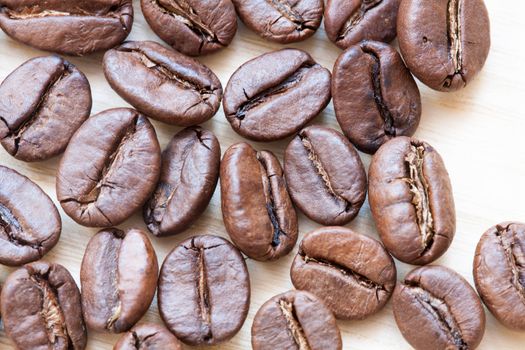 coffee beans on white wooden background