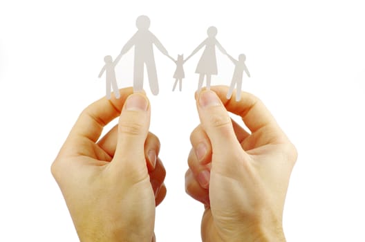 Paper family in hands isolated on white background