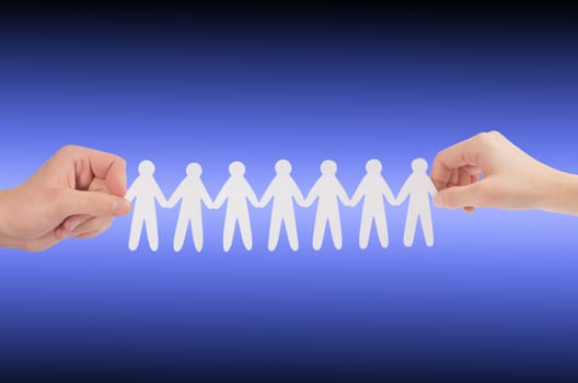 paper people in hands(man and woman)