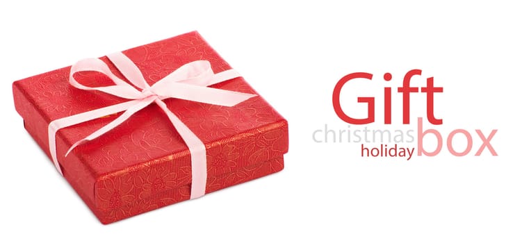 Single red gift box with pink ribbon on white background.