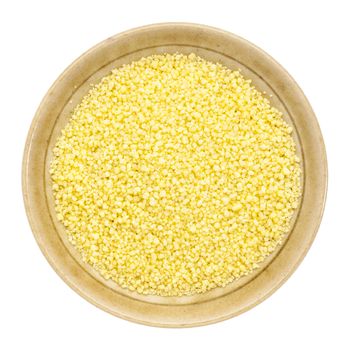 wheat couscous in a small ceramic bowl isolated on white, top view