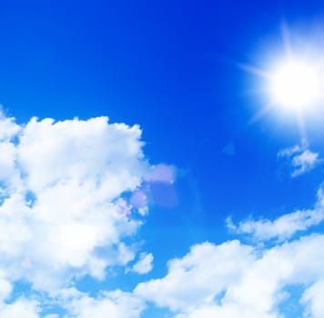 Blue sky with clouds and sun  