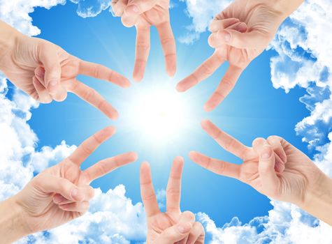 Hands of teamwork , forming the star shape
