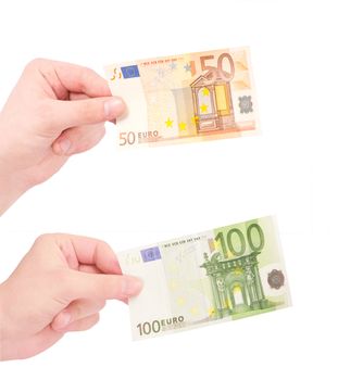 Money (Euro) in a hand isolated on white