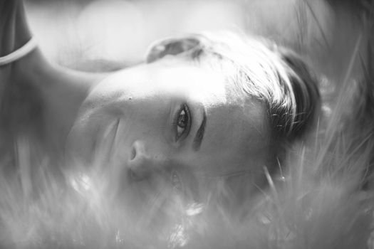 woman sleep on green grass