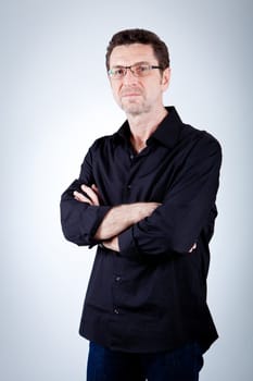 attractive adult man with glasses and black shirt portrait 