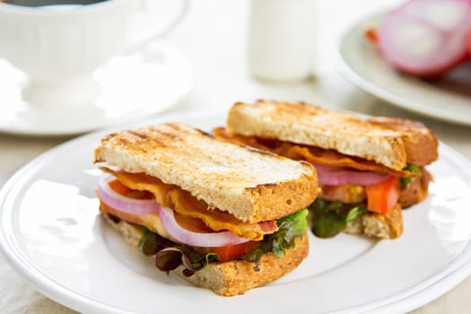 Bacon sandwich with tomato and lettuce