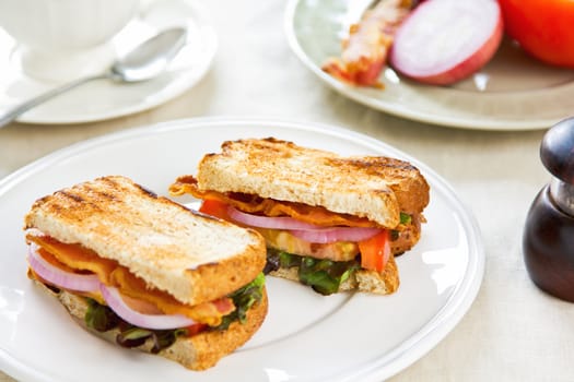 Bacon sandwich with tomato and lettuce