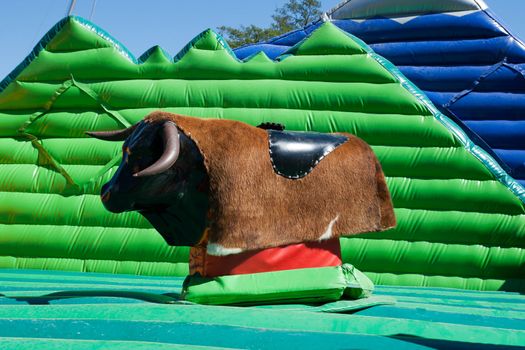 empty a mechanical bull in city amusement park