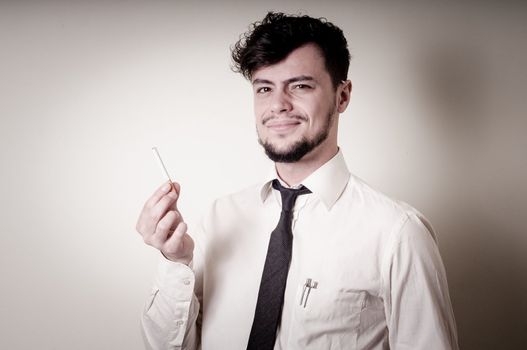 businessman stop smoking on gray background