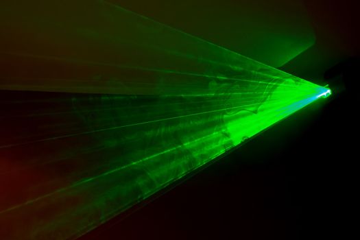 Green laser light with smoke and strobe effect