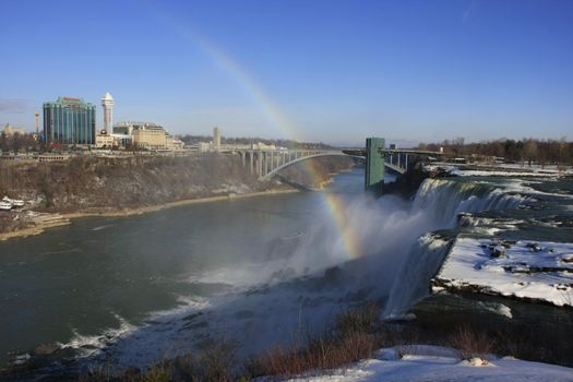 Niagara Falls and Rainbow Bridge in winter, New York, USA