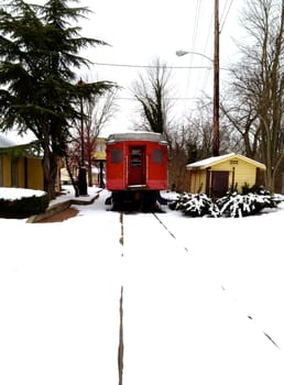 Red train car on the tracks