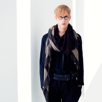 blond modern handsome student man with nerd glasses portrait