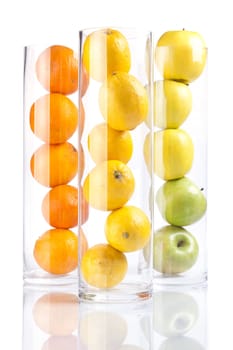 Group of fruit in glass: Oranges, Lemons, Appless