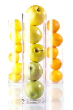 Group of fruit in glass: Oranges, Lemons, Appless