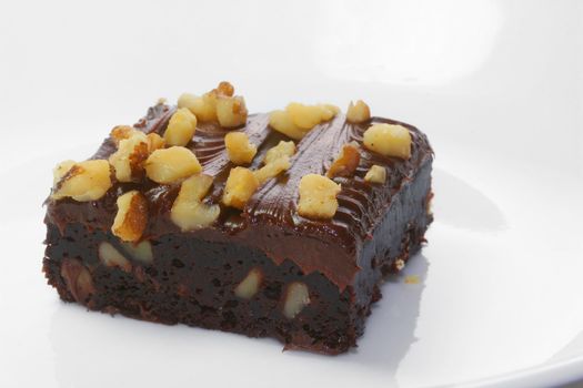 Chocolate fudge brownie with walnuts.