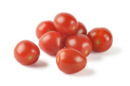 Group of cherry tomatoes isolated on a white background.
