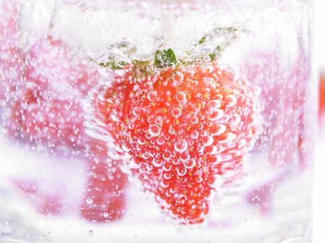 Fresh Strawberry in Mineral water with boobles