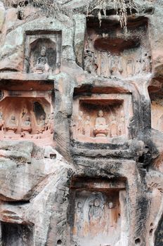 Ancient Buddha statue in caves in Sichuan, China