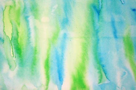 Abstract watercolor background with colorful layers on paper texture