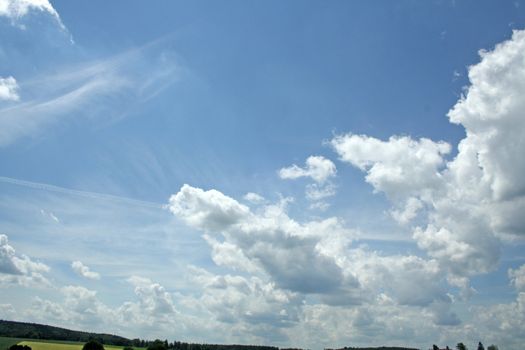 white clouds on blue sky